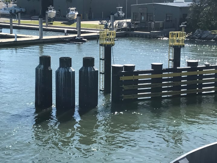 Dolphins at start of ferry terminal guidewalls